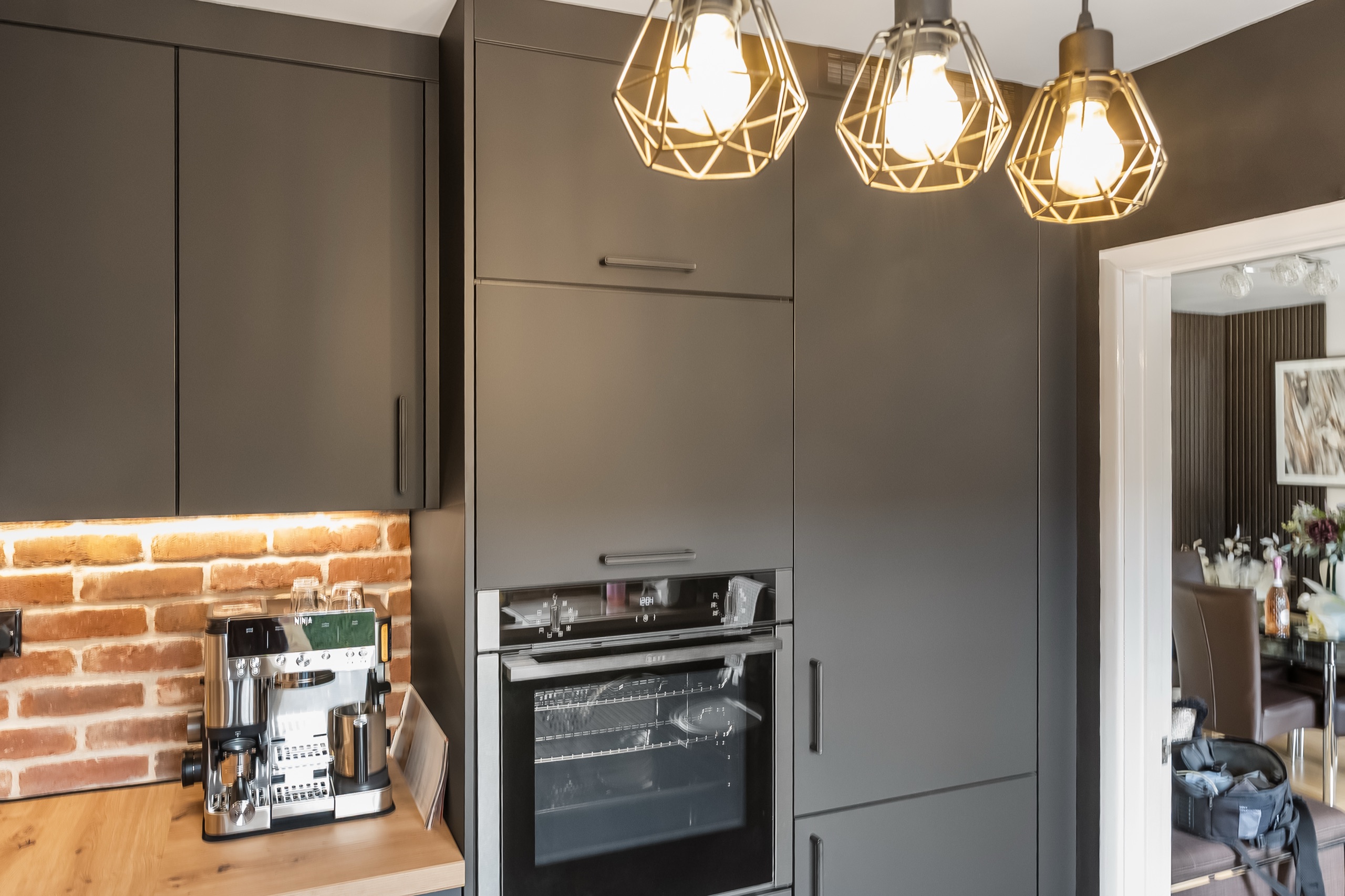 Targa kitchen in Steel Dark Effect with Elba Slate Sand Effect