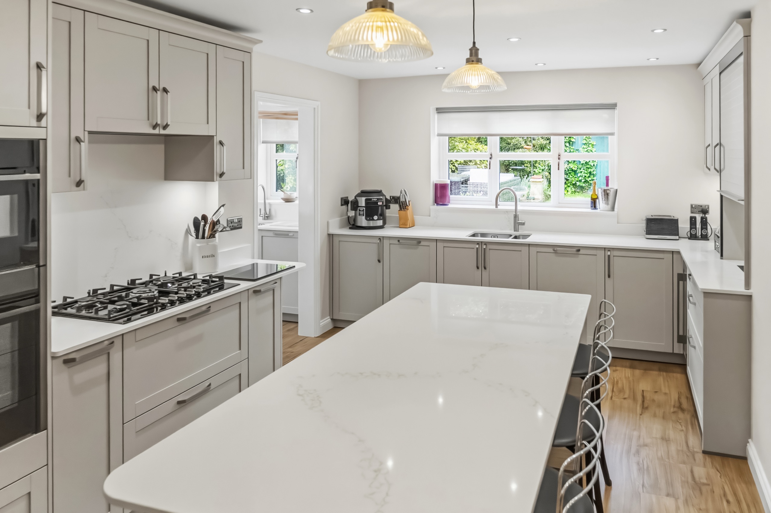 Vicenza kitchen in Crystal Grey with a marble effect island